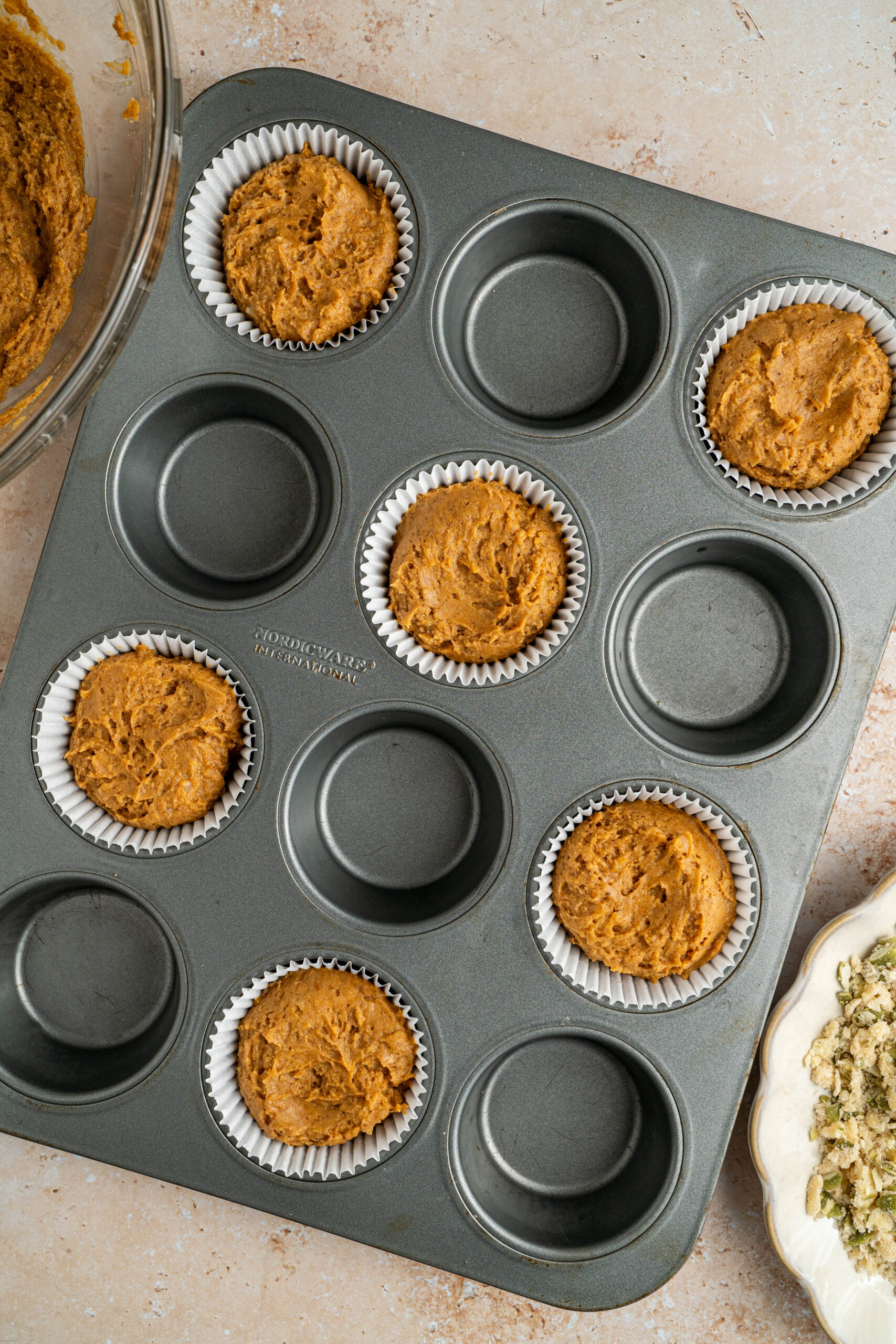 step four of how to make gluten free pumpkin banana bread muffins with protein